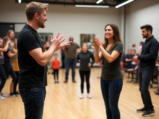 Photo of an energetic acting class or workshop in session.